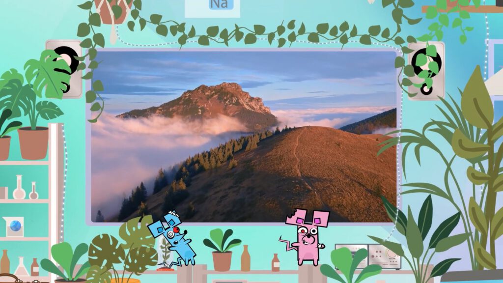 Misty mountain landscape on screen in the NRG Mission WattWeb lab, with cartoon mice Eddi and Joules below